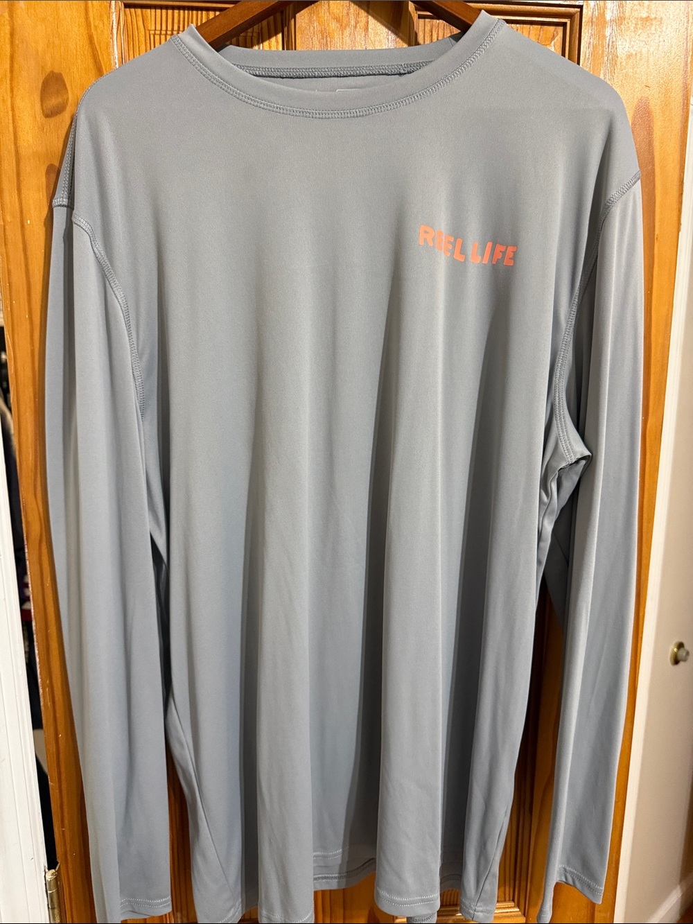 Reel Life Men’s Long-Sleeve Performance Tee — Light Gray with Coral Logo